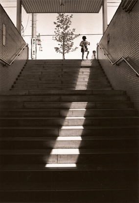 Boy at subway entrance, Nagoya, Japan, 1990